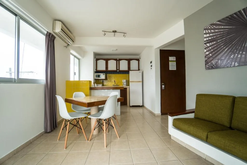 Apartment living and kitchen area at Hotel Suites Regina